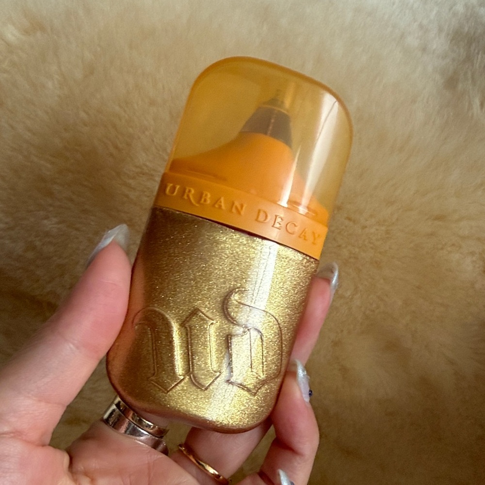 Urban decay face bond luminizer liquid highlight glow drops over the top *